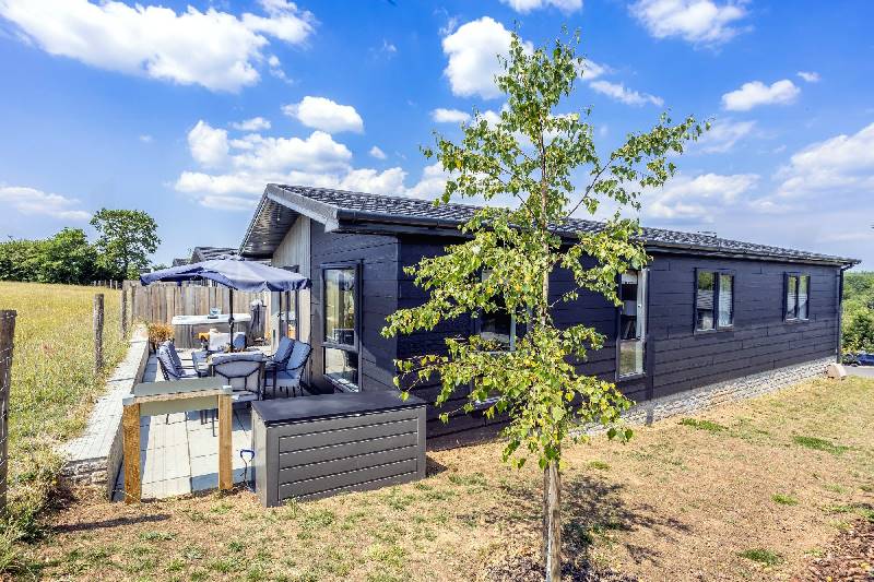 Click here for more about Heron Lodge, 10 Roadford Lake Lodges